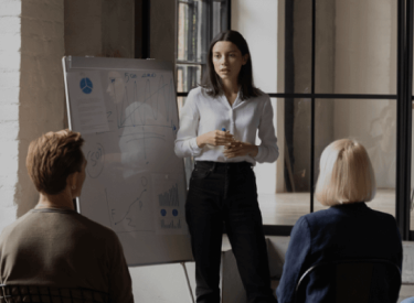 Group-1205 Several people in a meeting, representing discussions and planning for the ProWein 2023 event in Düsseldorf